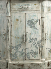 Load image into Gallery viewer, Iron Orchid Design Birds Branches Blossoms Decor Stamp shown on a dresser door 