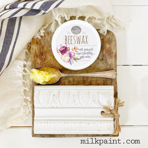 Sweet Pickins Milk Paint Beeswax Furniture Polish in clear on a spoon 